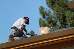 Roofer and his hammer Picture